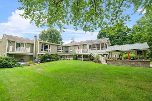 18 Sumac St, Billerica, MA 01821 - rear view of house featuring a sunroom, stairs, and a yard