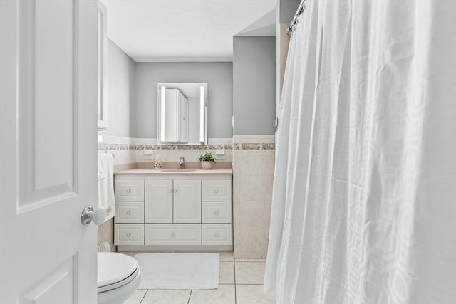 18 Sumac St, Billerica, MA 01821 - full bath with toilet, vanity, tile patterned floors, and a shower with curtain