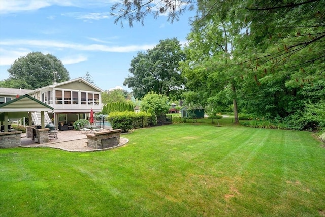 18 Sumac St, Billerica, MA 01821 - view of yard featuring a sunroom and a patio area