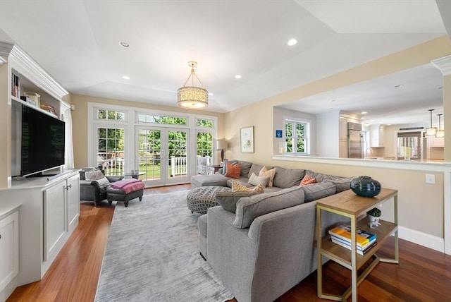 living room featuring wood finished floors and recessed lighting