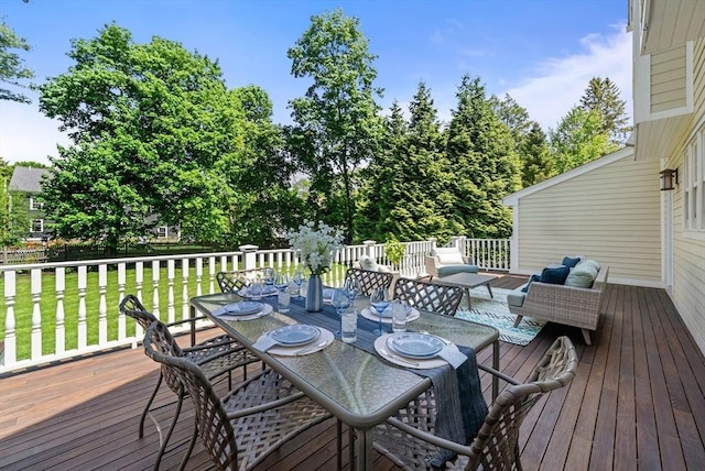 deck with outdoor lounge area and outdoor dining space