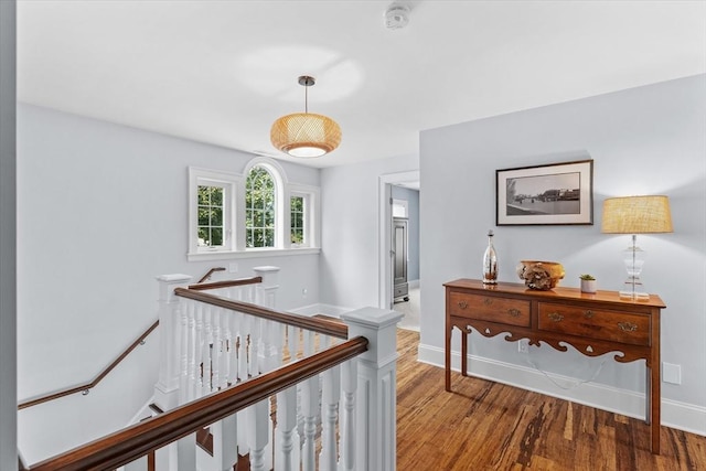 corridor featuring hardwood / wood-style flooring