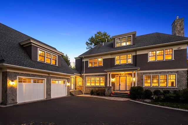 view of front of home with a garage