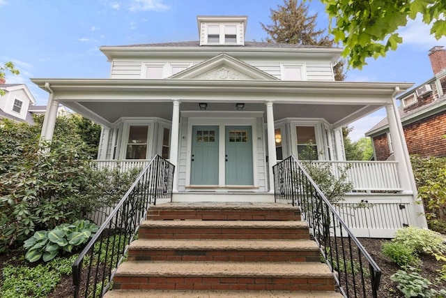 traditional style home featuring a porch