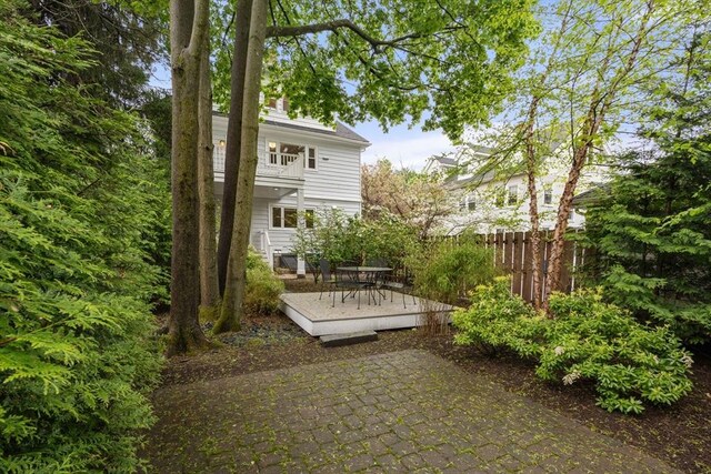 view of patio / terrace with fence and a deck