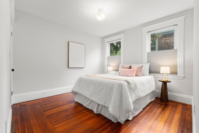 bedroom featuring baseboards