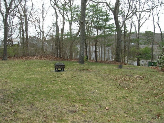 16 Neds Way, Plymouth, MA 02360 - view of green lawn featuring an outdoor fire pit