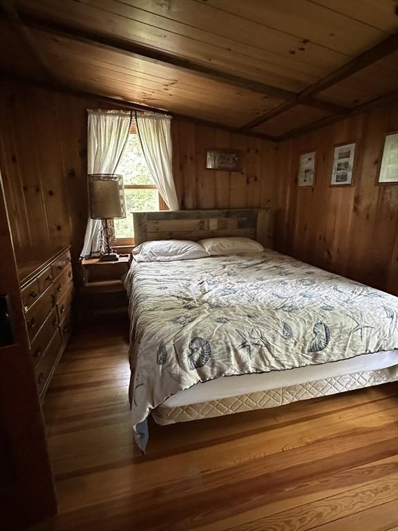 16 Neds Way, Plymouth, MA 02360 - bedroom featuring wood ceiling, vaulted ceiling, wood walls, and hardwood / wood-style flooring