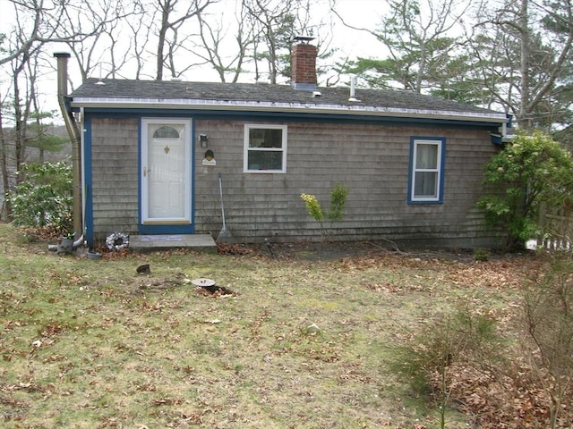 16 Neds Way, Plymouth, MA 02360 - rear view of property featuring a chimney