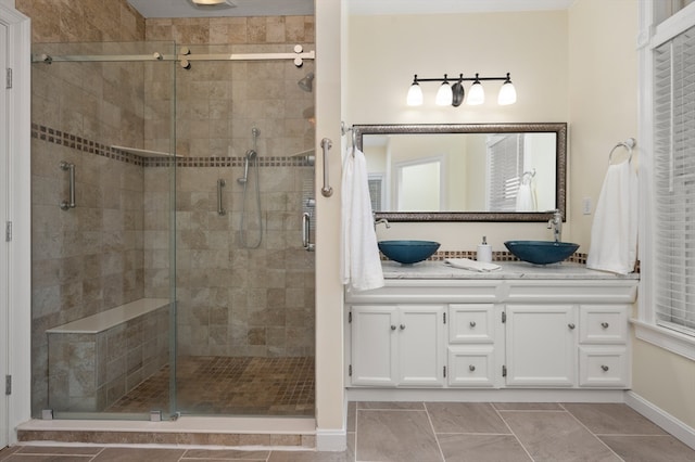 bathroom with vanity and an enclosed shower