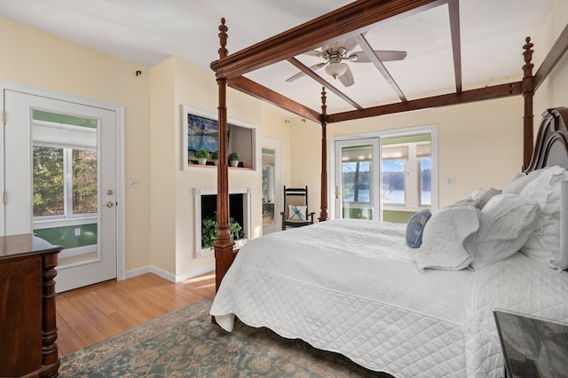 bedroom with ceiling fan and light hardwood / wood-style floors