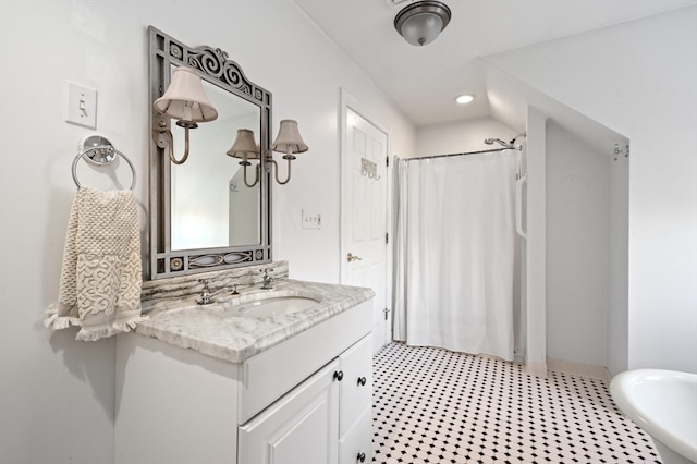 bathroom with a shower with curtain and vanity