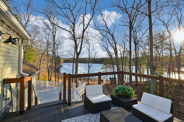 deck featuring a water view