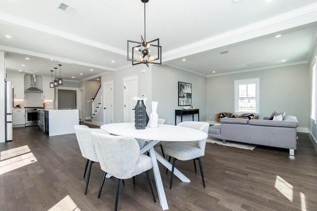 dining room featuring dark wood-type flooring, recessed lighting, visible vents, and stairway