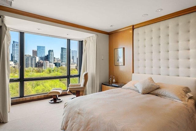 2 Commonwealth Ave Unit 14B, Boston, MA 02116 - bedroom with crown molding, carpet, a city view, and visible vents