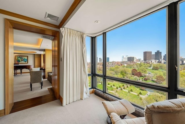 2 Commonwealth Ave Unit 14B, Boston, MA 02116 - sunroom / solarium featuring a city view and visible vents