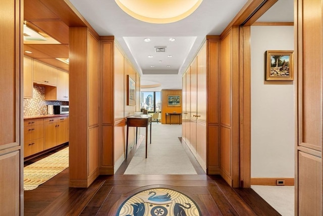 2 Commonwealth Ave Unit 14B, Boston, MA 02116 - hallway featuring baseboards, wood finished floors, and visible vents