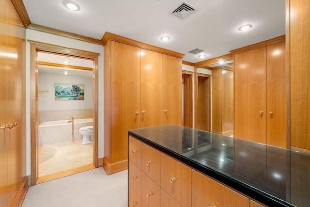 2 Commonwealth Ave Unit 14B, Boston, MA 02116 - kitchen featuring light colored carpet, visible vents, ornamental molding, and recessed lighting