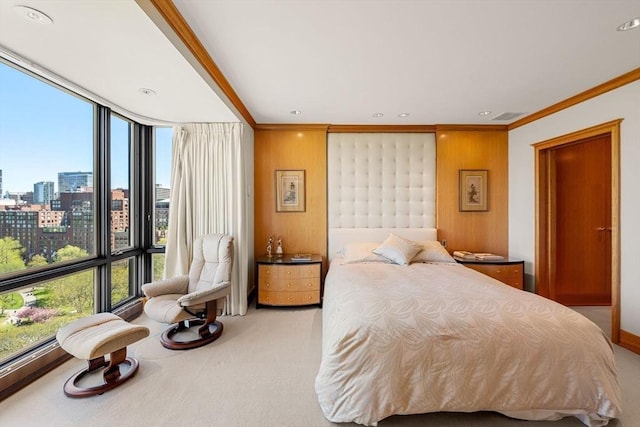 2 Commonwealth Ave Unit 14B, Boston, MA 02116 - bedroom with ornamental molding, light carpet, wood walls, and visible vents
