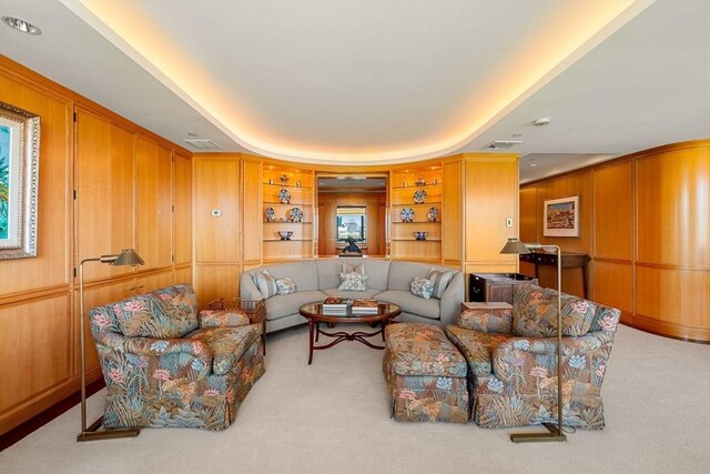 2 Commonwealth Ave Unit 14B, Boston, MA 02116 - living area featuring visible vents, wooden walls, and light carpet