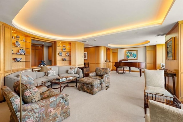 2 Commonwealth Ave Unit 14B, Boston, MA 02116 - living room with carpet floors, a tray ceiling, visible vents, and built in features
