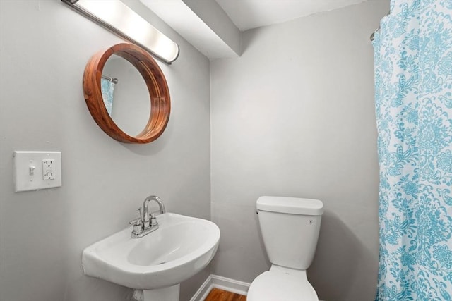 117 Sycamore St Unit 1, Boston, MA 02131 - full bath with a sink, toilet, and a shower with curtain