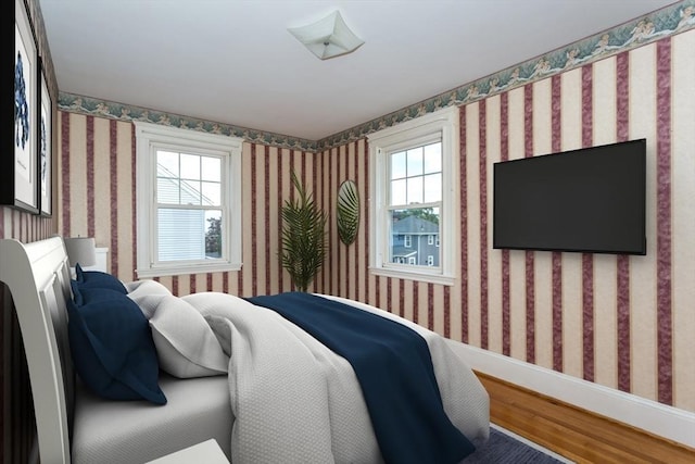 24 Neponset Rd, Quincy, MA 02169 - bedroom with multiple windows, wallpapered walls, wood finished floors, and baseboards