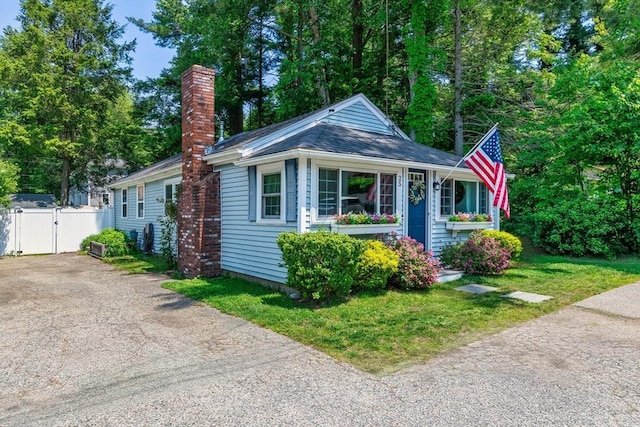 25 12th Ave, Halifax, MA 02338 - view of front of home featuring a gate, a chimney, and driveway