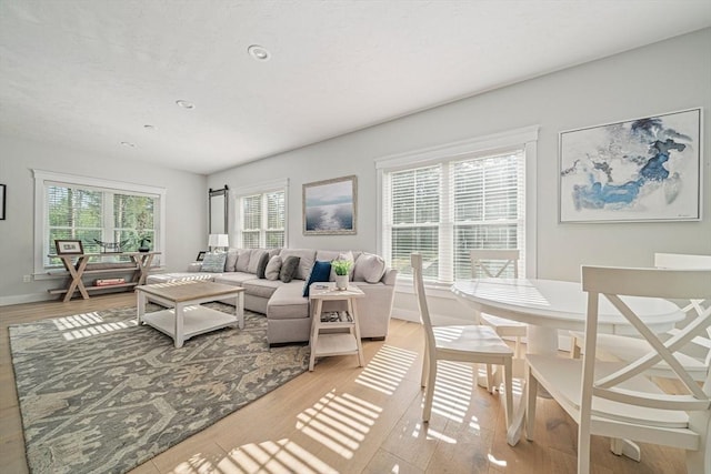 living room featuring recessed lighting and light wood finished floors