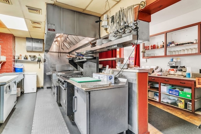 kitchen featuring a paneled ceiling