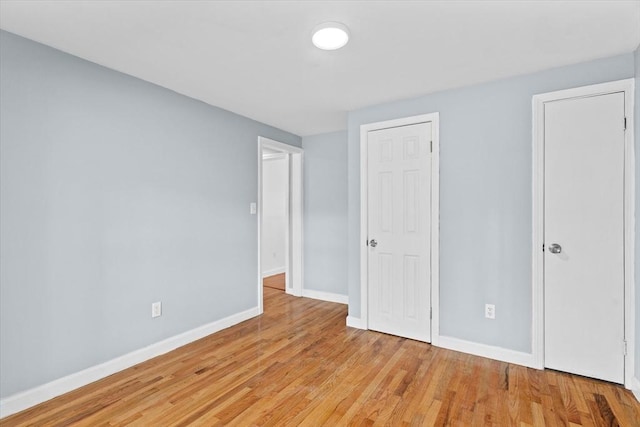 260 Great Rd, Stow, MA 01775 - unfurnished bedroom with light wood-type flooring and baseboards