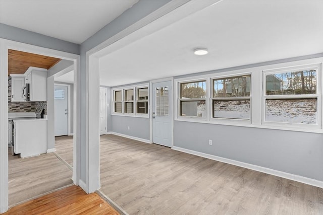 260 Great Rd, Stow, MA 01775 - interior space with light wood-type flooring and baseboards