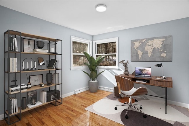 260 Great Rd, Stow, MA 01775 - office space featuring baseboard heating, baseboards, and wood finished floors