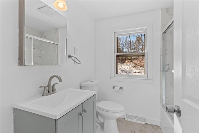 260 Great Rd, Stow, MA 01775 - full bathroom featuring vanity, visible vents, toilet, marble finish floor, and baseboards