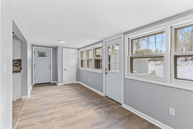 260 Great Rd, Stow, MA 01775 - interior space with baseboards and wood finished floors