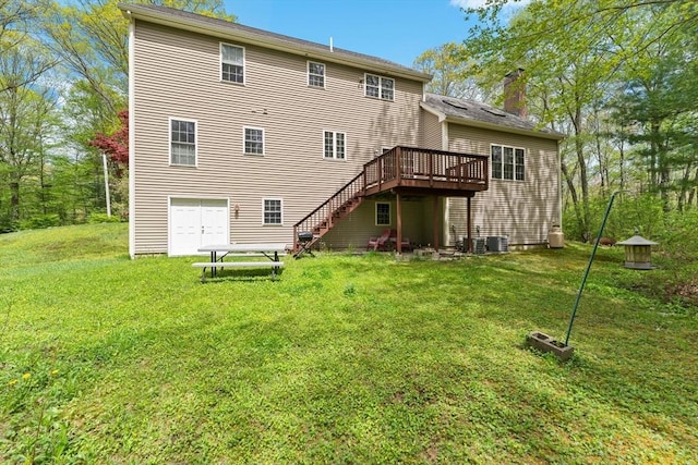 rear view of house featuring a wooden deck, stairway, a yard, a chimney, and central air condition unit