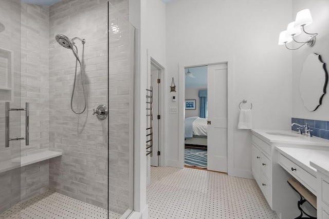 124 Osgood Rd, Charlton, MA 01507 - full bathroom with a stall shower, vanity, connected bathroom, and tile patterned floors