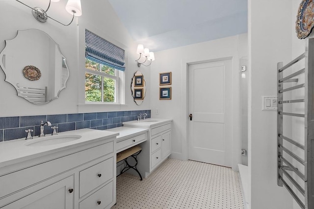 124 Osgood Rd, Charlton, MA 01507 - full bath featuring tile patterned floors, vanity, tasteful backsplash, radiator, and lofted ceiling