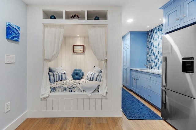 124 Osgood Rd, Charlton, MA 01507 - bedroom featuring stainless steel fridge with ice dispenser, light wood-type flooring, a sink, baseboards, and recessed lighting