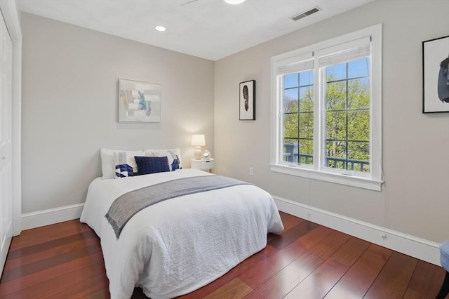 58 Bridle Path, Tewksbury, MA 01876 - bedroom with baseboards, multiple windows, wood finished floors, and visible vents