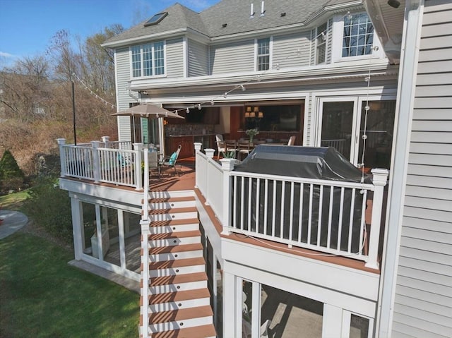 58 Bridle Path, Tewksbury, MA 01876 - back of property featuring a wooden deck and a shingled roof