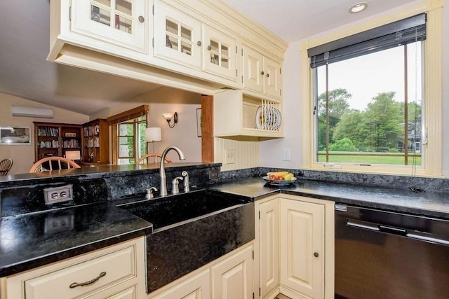 670 Front St, Marion, MA 02738 - kitchen with black dishwasher, dark countertops, cream cabinetry, glass insert cabinets, and vaulted ceiling