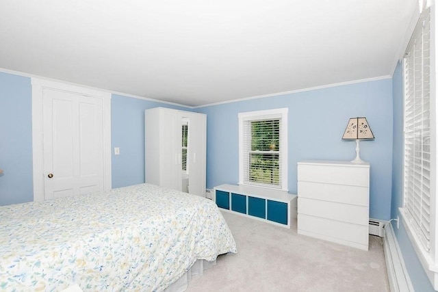 670 Front St, Marion, MA 02738 - bedroom with carpet floors, a baseboard radiator, crown molding, a baseboard heating unit, and a closet