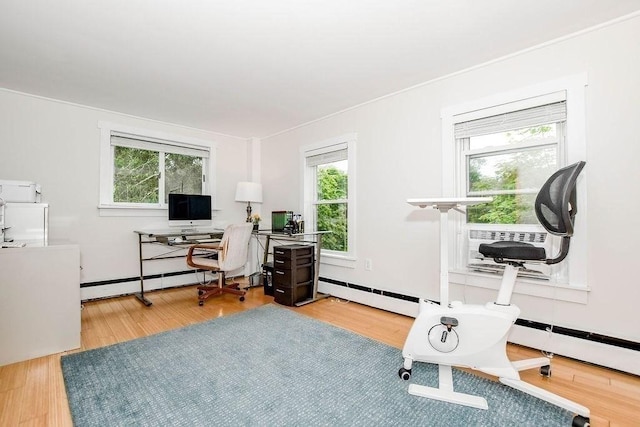 670 Front St, Marion, MA 02738 - home office featuring a baseboard heating unit, wood finished floors, cooling unit, and baseboard heating
