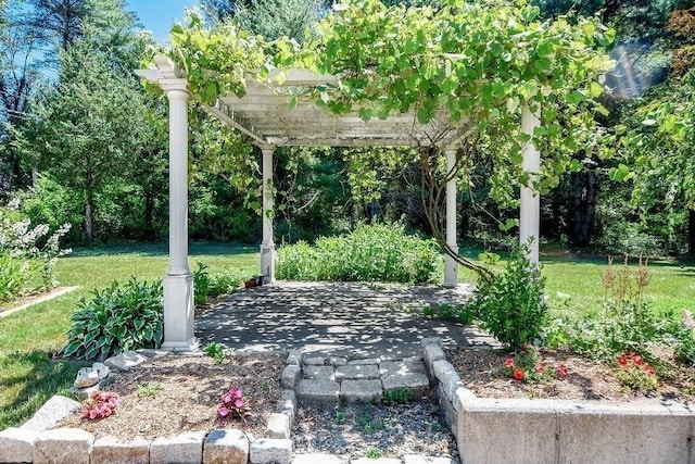 670 Front St, Marion, MA 02738 - view of green lawn with a pergola and a patio area