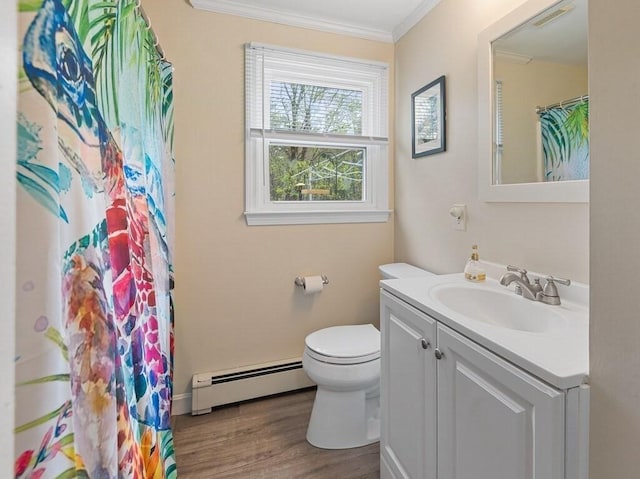 full bathroom with visible vents, ornamental molding, vanity, wood finished floors, and a baseboard heating unit