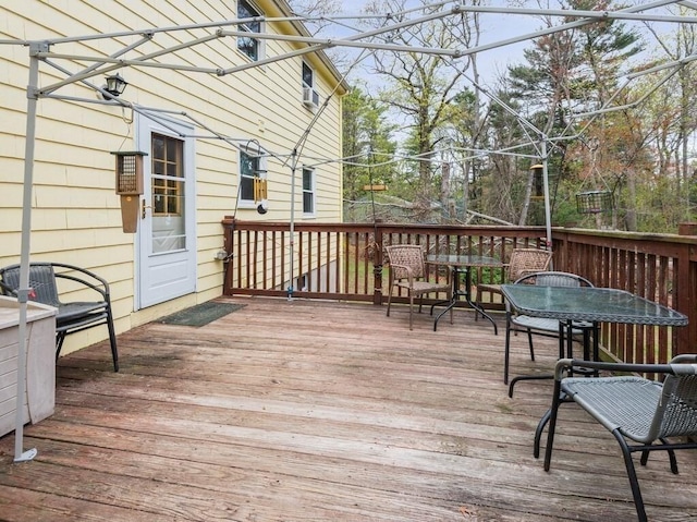 deck with outdoor dining space