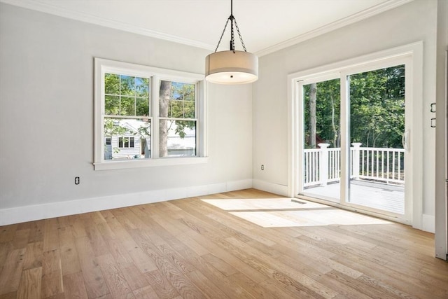 108 S St, Reading, MA 01867 - unfurnished dining area with crown molding and wood finished floors