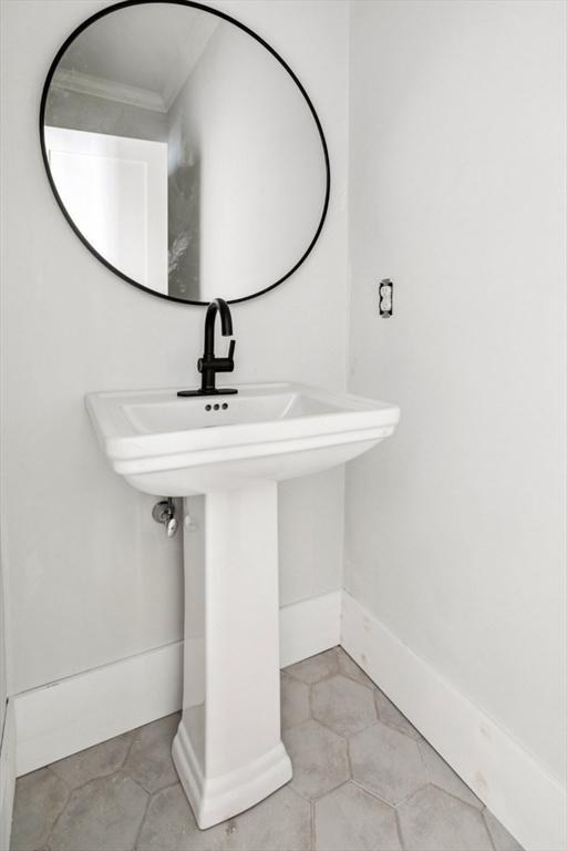 108 S St, Reading, MA 01867 - bathroom featuring a sink and tile patterned floors