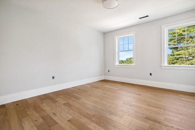 108 S St, Reading, MA 01867 - spare room with healthy amount of natural light and light wood-type flooring